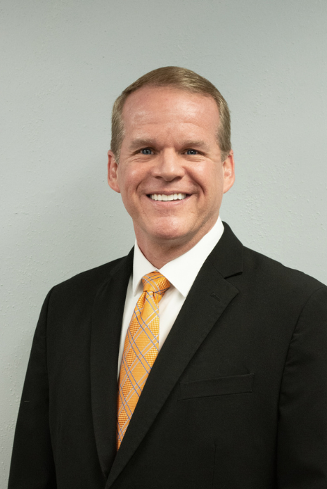 Rev. Dean Roy a man wearing a hat and glasses