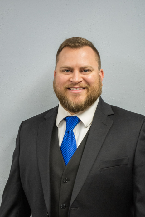 Rev. Jarid McCool a man wearing a hat and glasses