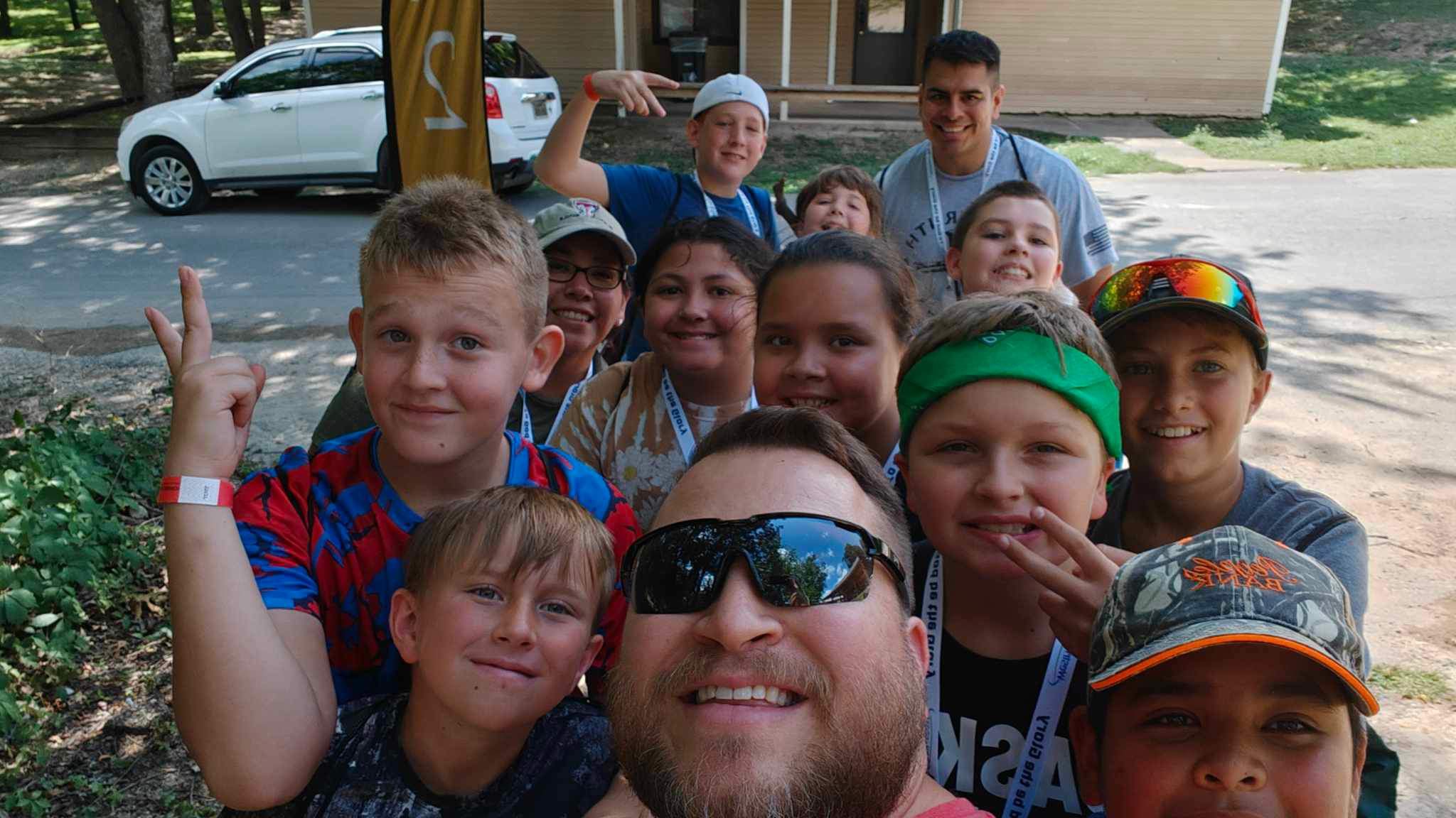 Westmont youth woman in grey t-shirt and black pants in water