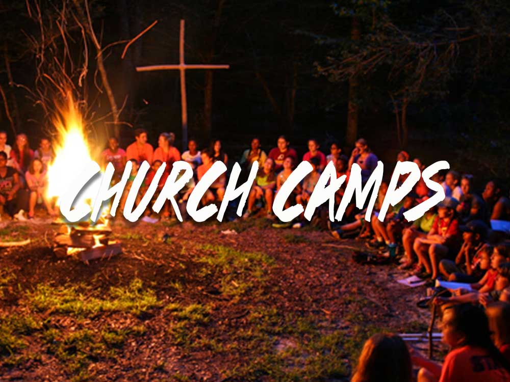 woman beside white vehicle during daytime