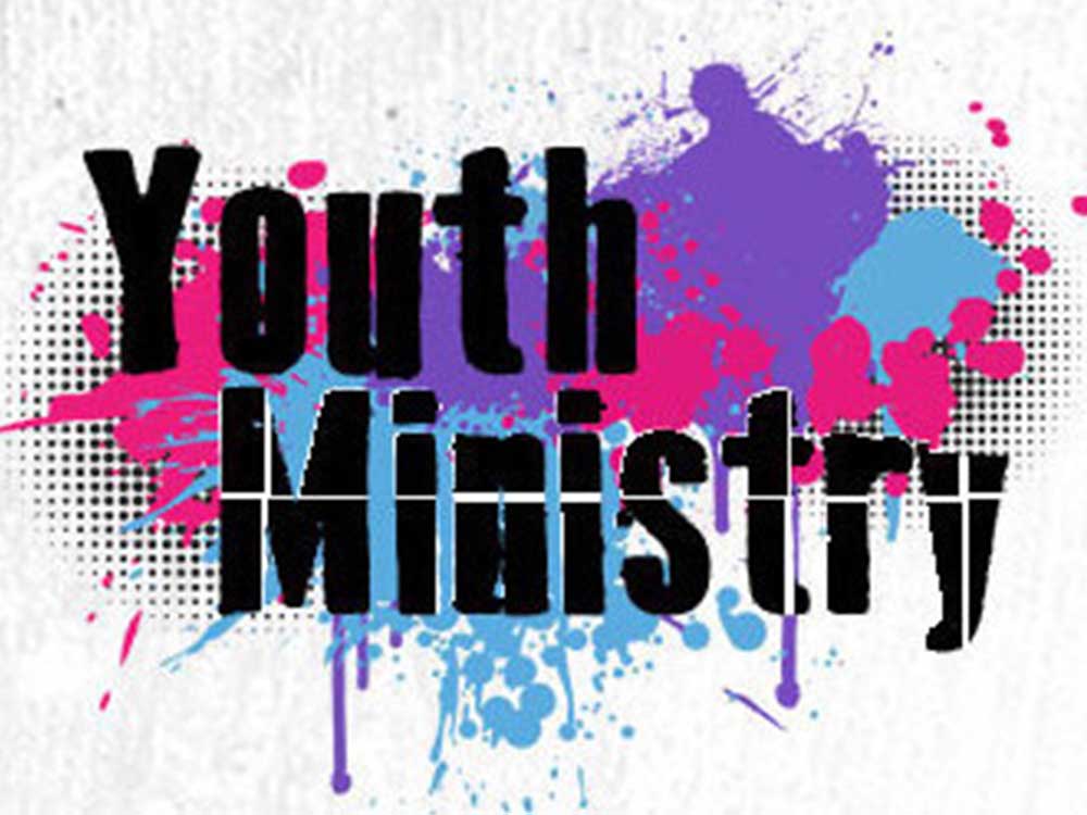 westmont youth three men and laughing two women walking side by side