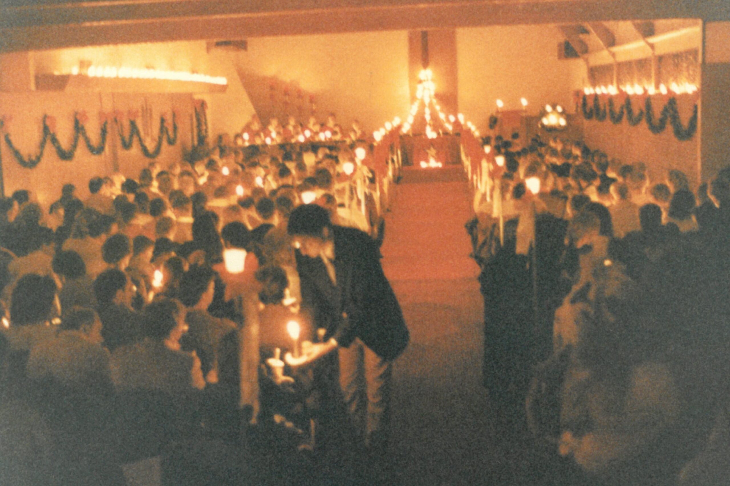 Christmas Eve in the old sanctuary woman reading book while sitting on chair