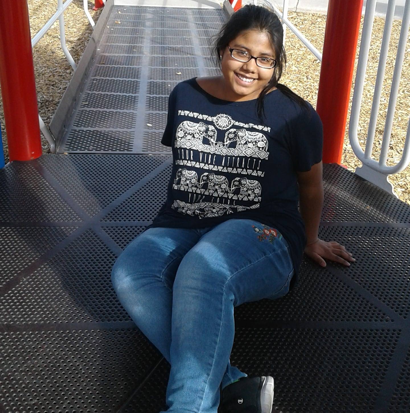 a man wearing a hat and glasses