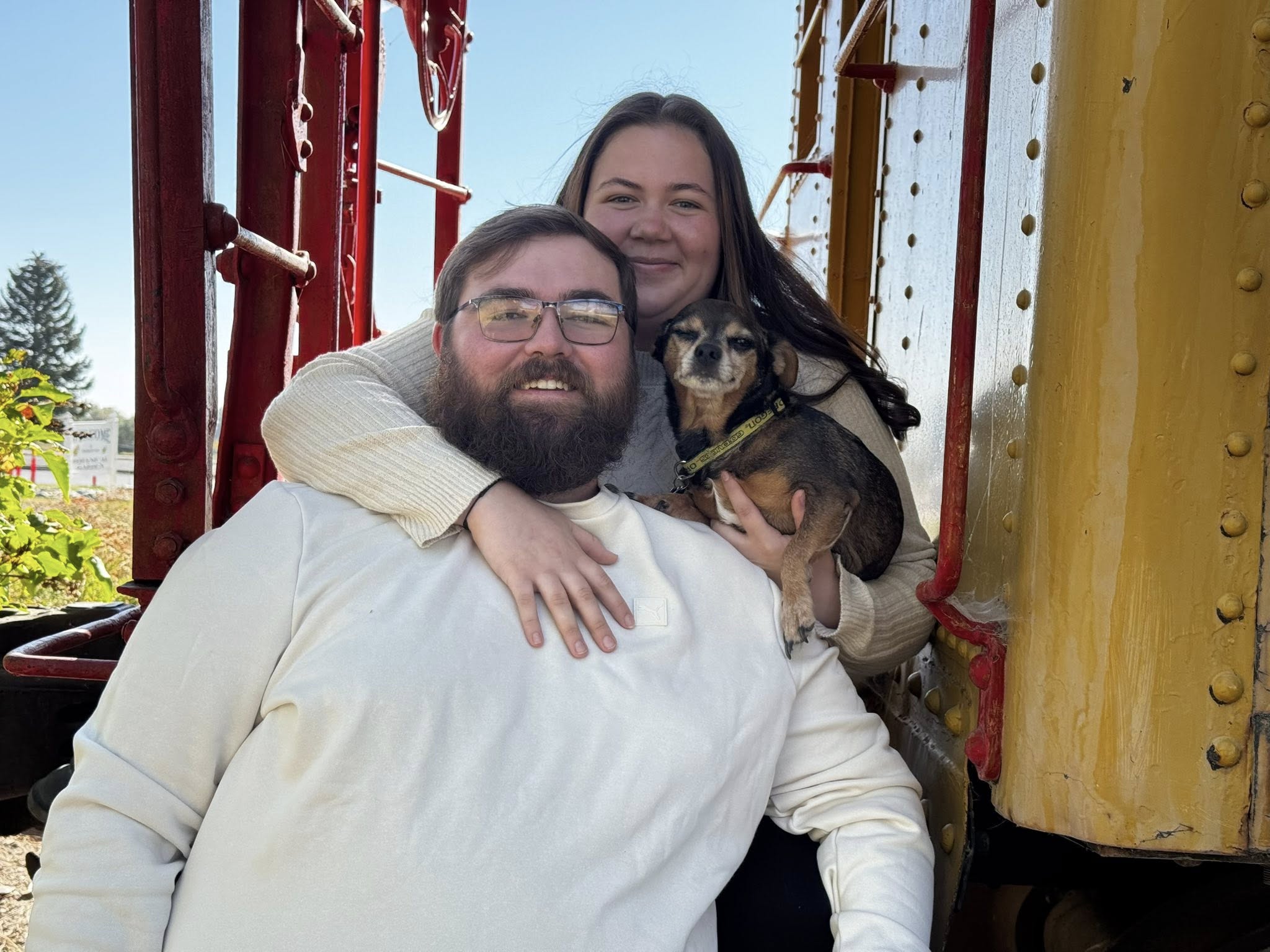 a man standing on top of a pile of snow
